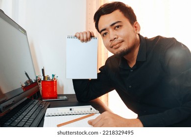 Handsome Young Ambitious Developer Working Alone At The Office 