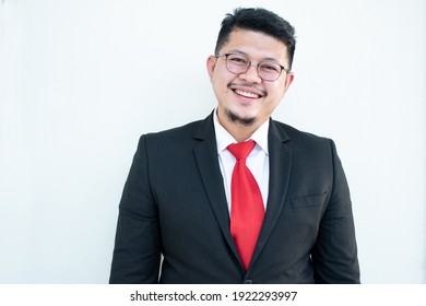 Handsome Young Business Man Wear Glasses Red Tie In A Suit And West.