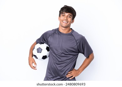 Handsome young football player man isolated on white background posing with arms at hip and smiling - Powered by Shutterstock