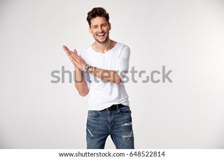 Handsome young guy posing in studio - isolated