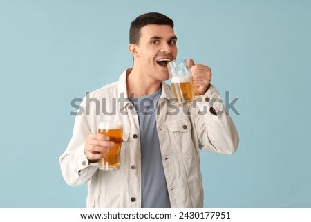 Similar – Image, Stock Photo Portrait of a young man with a beer glass in his hand