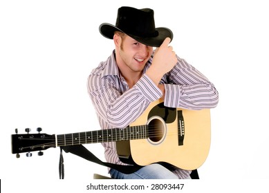 Handsome young male country & western singer, performer with guitar.  Studio shot, white background.