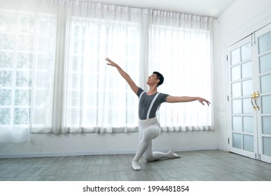 Handsome Young Male Dancer Practice Dance An Exercise At Home, Social Distance During Quarantine