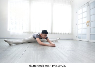 Handsome Young Male Dancer Practice Dance An Exercise At Home, Social Distance During Quarantine