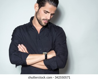 Handsome Young Man In Black Dress Shirt Wearing A Wristwatch 