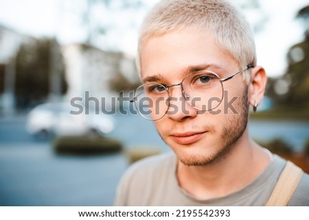 Similar – Man with gray hair and yellow turban.