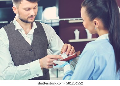 Handsome Young Man Buying Jewelry At The Local Jewelry Store