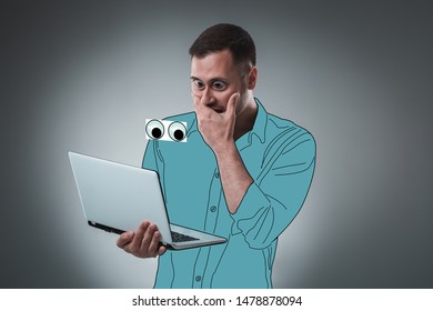 Handsome young man with a cartoon eyes and shirt is holding a laptop, looking at it and acting like he is shocked. - Powered by Shutterstock