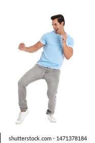 Handsome Young Man Dancing On White Background