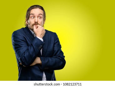 Handsome young man doubt expression, confuse and wonder concept, uncertain future