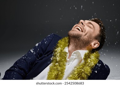 A handsome young man enjoys a moment of laughter, adorned with festive decorations and snowflakes. - Powered by Shutterstock