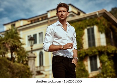 Handsome Young Man In Front Of Luxury Home Villa