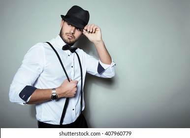 Handsome Young Man With Hat And Wrist Watch