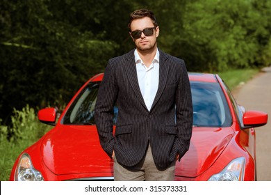 Handsome Young Man In His New Sports Car. 