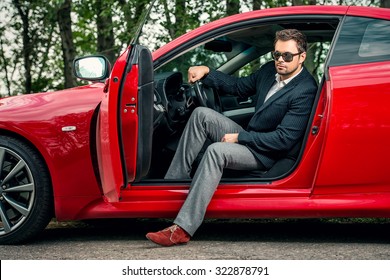 Handsome Young Man In His New Sports Car. 