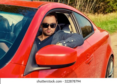 Handsome Young Man In His New Sports Car. 