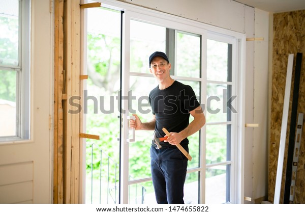 Handsome Young Man Installing Double Sliding Stock Photo Edit Now