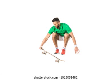 handsome young man jumping with longboard isolated on white