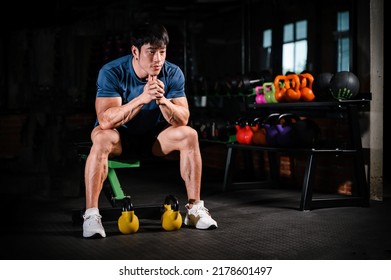 Handsome Young Man Looking Forward After Exercise Class At A Gym.Bodybuilding, Weightlifting, Sport