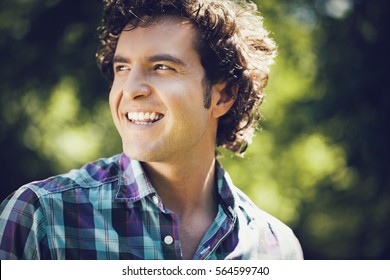 Handsome Young Man Outdoors - Powered by Shutterstock