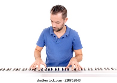 Handsome Young Man Playing The Piano Isolated In White Background