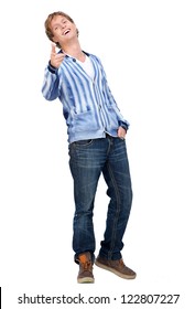 Handsome Young Man Pointing His Finger And Looking At Camera. Full Body Portrait Of Male Model Is Smiling And Isolated On White Background.