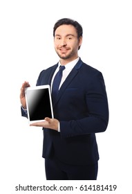Handsome young man posing with tablet on white background