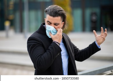 Handsome Young Man Pulling Off Corona Mask Angry