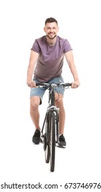 Handsome Young Man Riding Bicycle On White Background