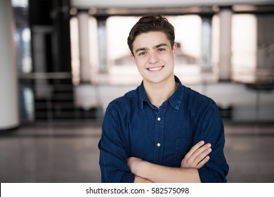 Handsome Young Man Smiling Indoors