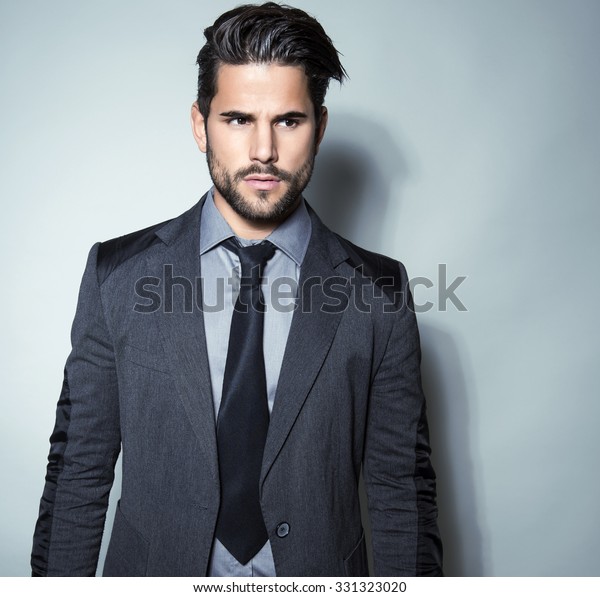 Handsome Young Man Suit On Grey Stock Photo 331323020 | Shutterstock