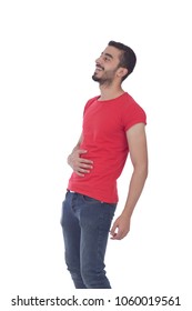 Handsome Young Man Wearing A Casual Outfit, Putting His Hand On His Tummy, Feeling So Full, Isolated On White Background