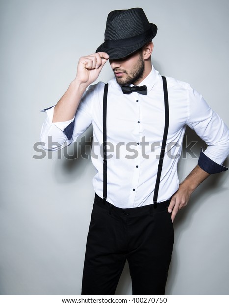 white button up shirt with suspenders