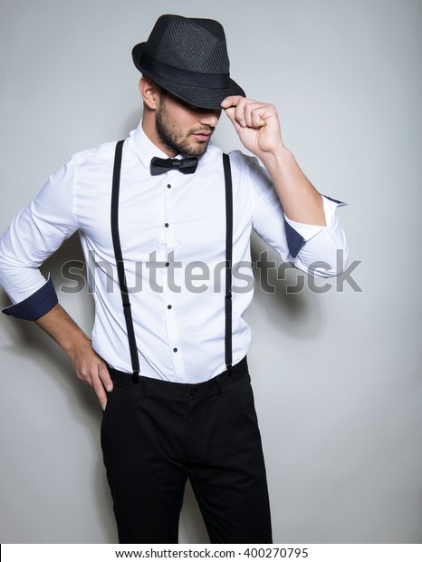 white dress shirt with suspenders