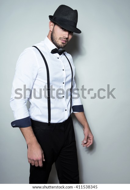 white button up shirt with suspenders