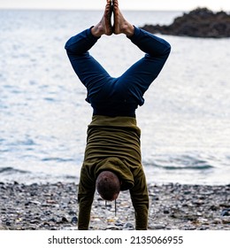 Handstand Calisthenics Man On Beach In Front Of Ocean