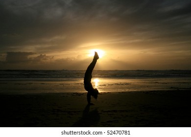 handstand in sunset