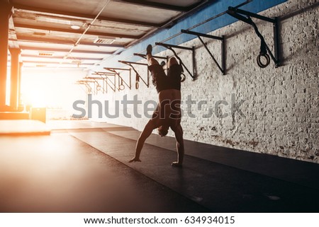 handstanding for athletic man