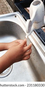 Handwash in sink for cleansing hand - Shutterstock ID 2311803307