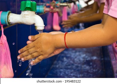 Handwashing, Teachers that schools are teaching children to wash their hands - Powered by Shutterstock