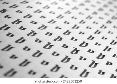 Handwriting black and white symbol filling pattern. Calligraphic letter V learning skills paper page. Calligraphy letters v background. Lettering practice writing worksheet.