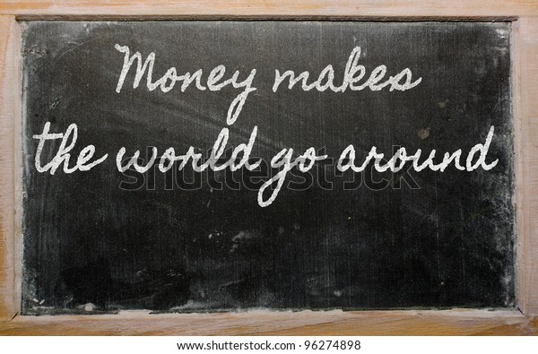 handwriting blackboard writings - Money makes the\
world go around