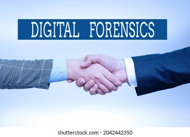 Handwriting text Digital Forensics. Business concept investigation of material found in digital devices Two Professional Well-Dressed Corporate Businessmen Handshake Indoors
