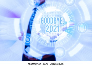 Handwriting Text Goodbye 2021. Word Written On New Year Eve Milestone Last Month Celebration Transition Gentelman Uniform Standing Holding New Futuristic Technologies.