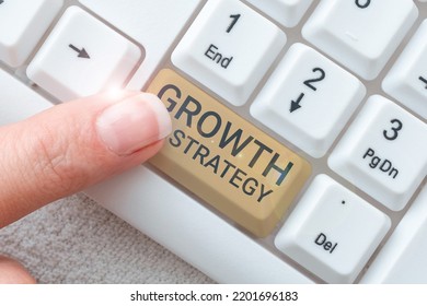 Handwriting text Growth StrategyStrategy aimed at winning larger market share in short-term. Conceptual photo Strategy aimed at winning larger market share in shortterm - Shutterstock ID 2201696183