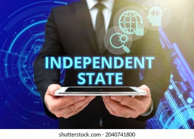 Handwriting Text Independent State. Business Showcase Ability Of The State To Be Independent And Have Autonomy Man In Office Uniform Holding Tablet Displaying New Modern Technology.