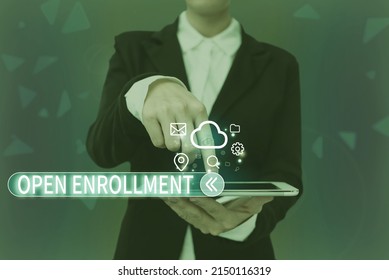 Handwriting text Open Enrollment. Internet Concept The yearly period when showing can enroll an insurance Lady Pressing Screen Of Mobile Phone Showing The Futuristic Technology - Shutterstock ID 2150116319