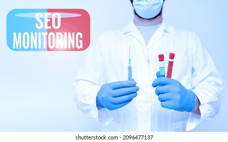 Handwriting Text Seo Monitoring. Word Written On Tracking The Progress Of Strategy Made In The Platform Chemist Explains Vaccination Program, Virus Prevention Procedures