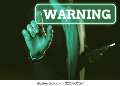 Handwriting text Warning. Concept meaning statement or event that indicates a possible or impending danger - Shutterstock ID 2228700167