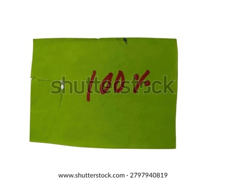 A handwritten note displaying one hundred percent in red ink on a small green paper scrap, isolated for business or marketing concepts.